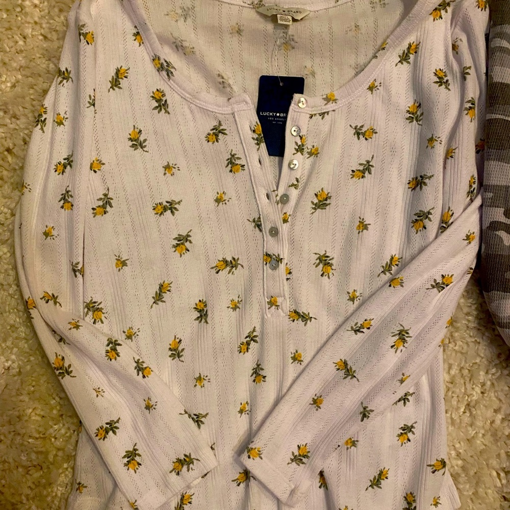 Lucky Brand size Medium-white with yellow flower detail.